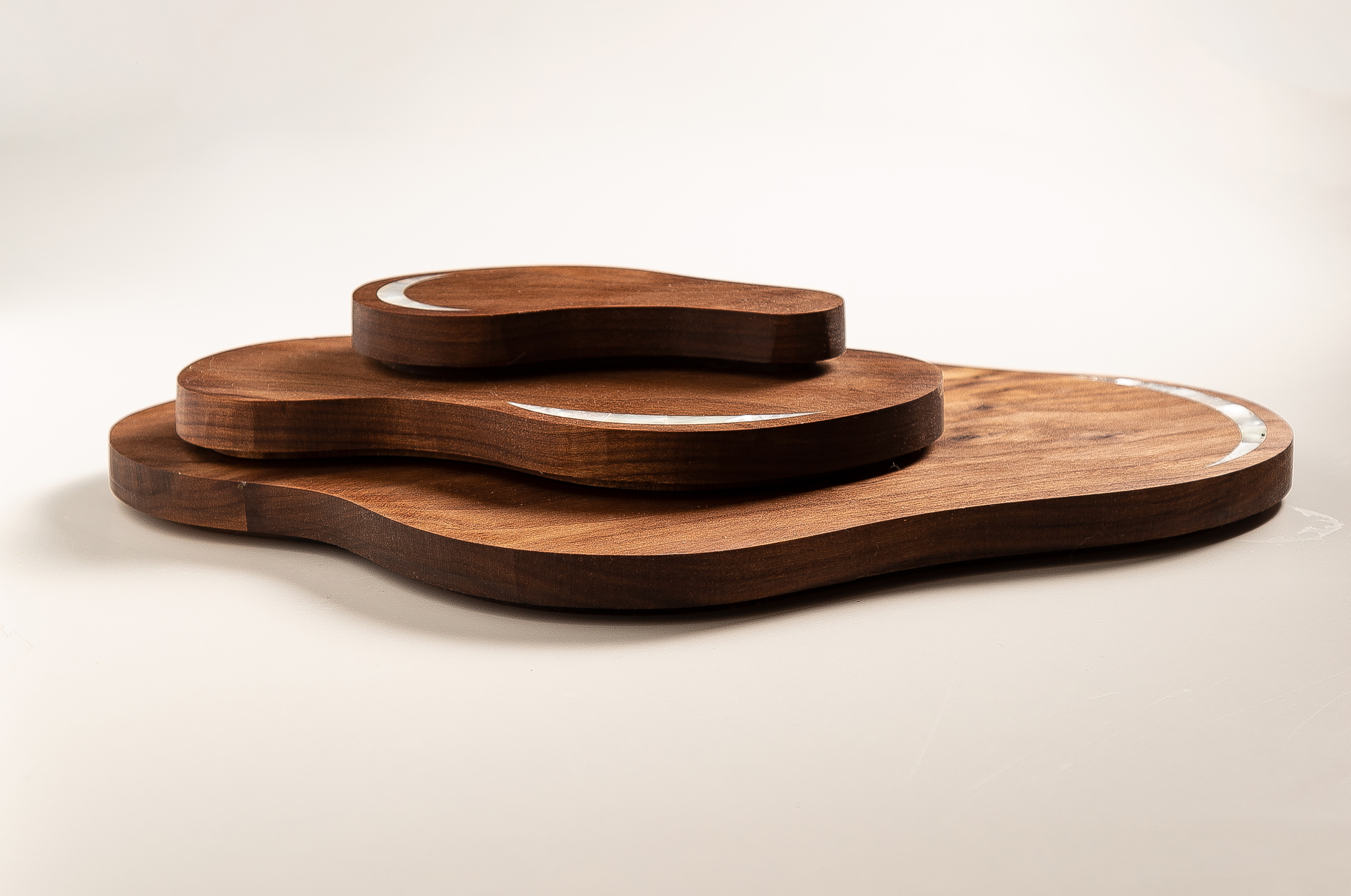 The Motion Platter is a unique ceremonial piece, used to serve your guests cheese, breads, pastries, and fruits. 