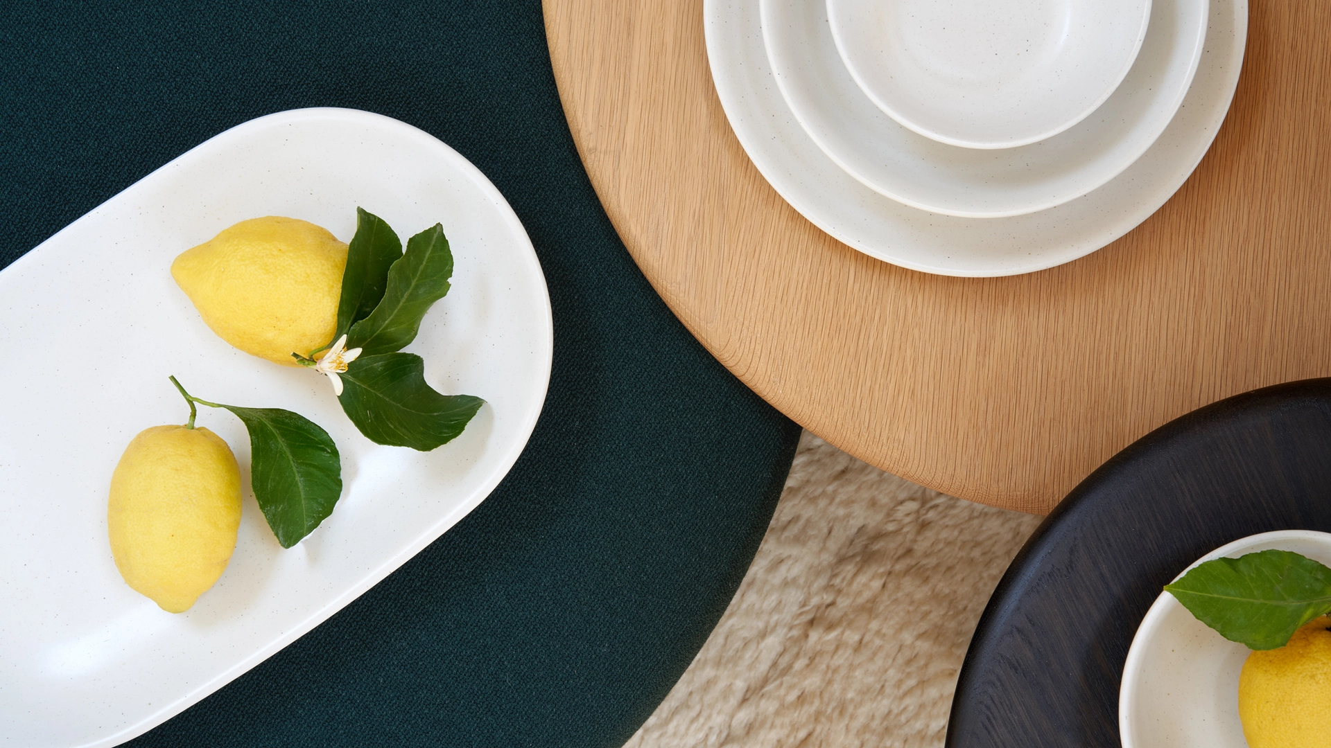 Monoware's ceramic pieces shown on Fred Rigby's signature Raindrop tables for London Design Festival 2023.