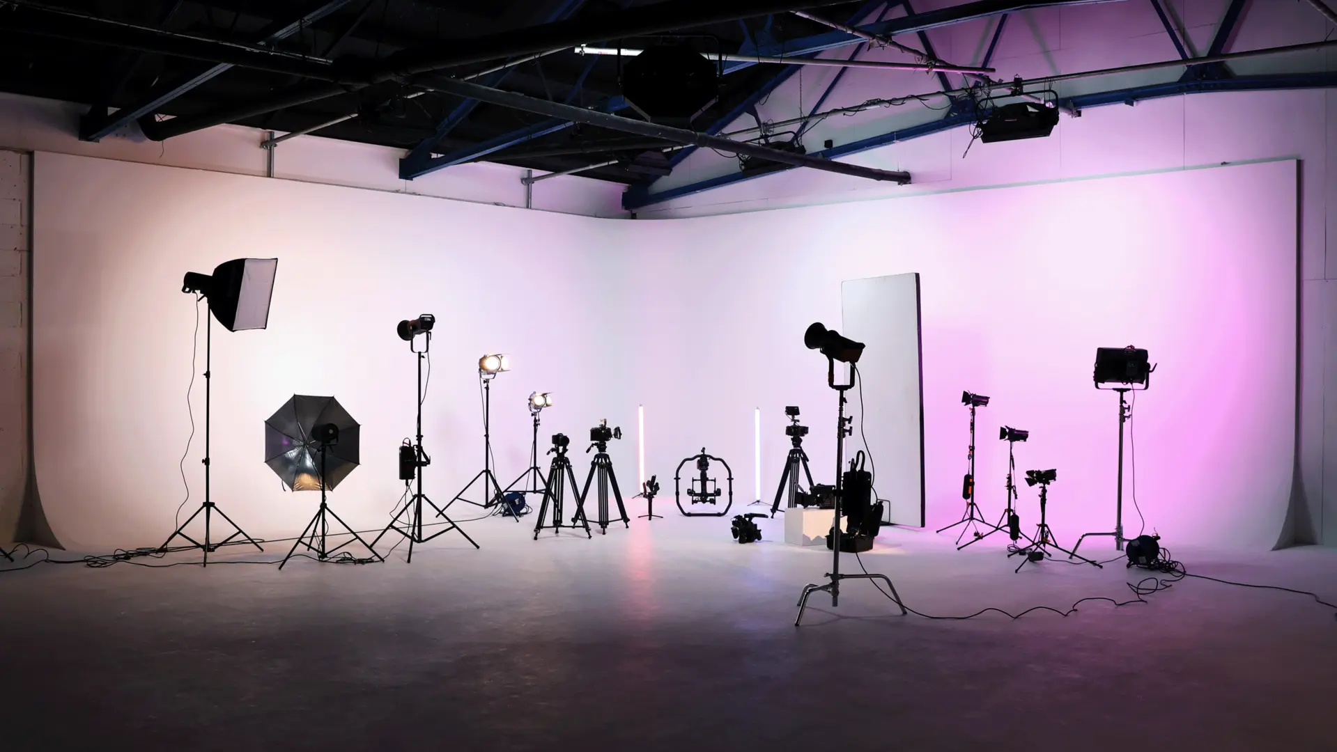 Infinity Cove studio with camera and lighting equipment on display
