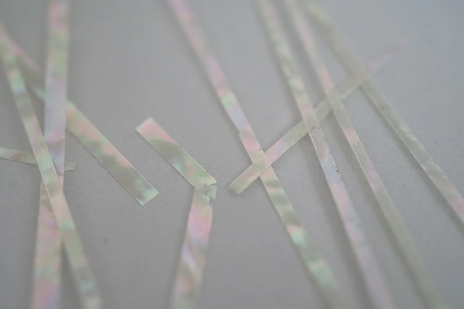 Cutting mother of pearl, recycled abalone shell.