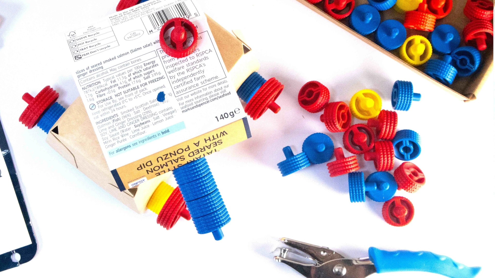 top down view of snapkit pack with connectors, vehicle creation and hole punch