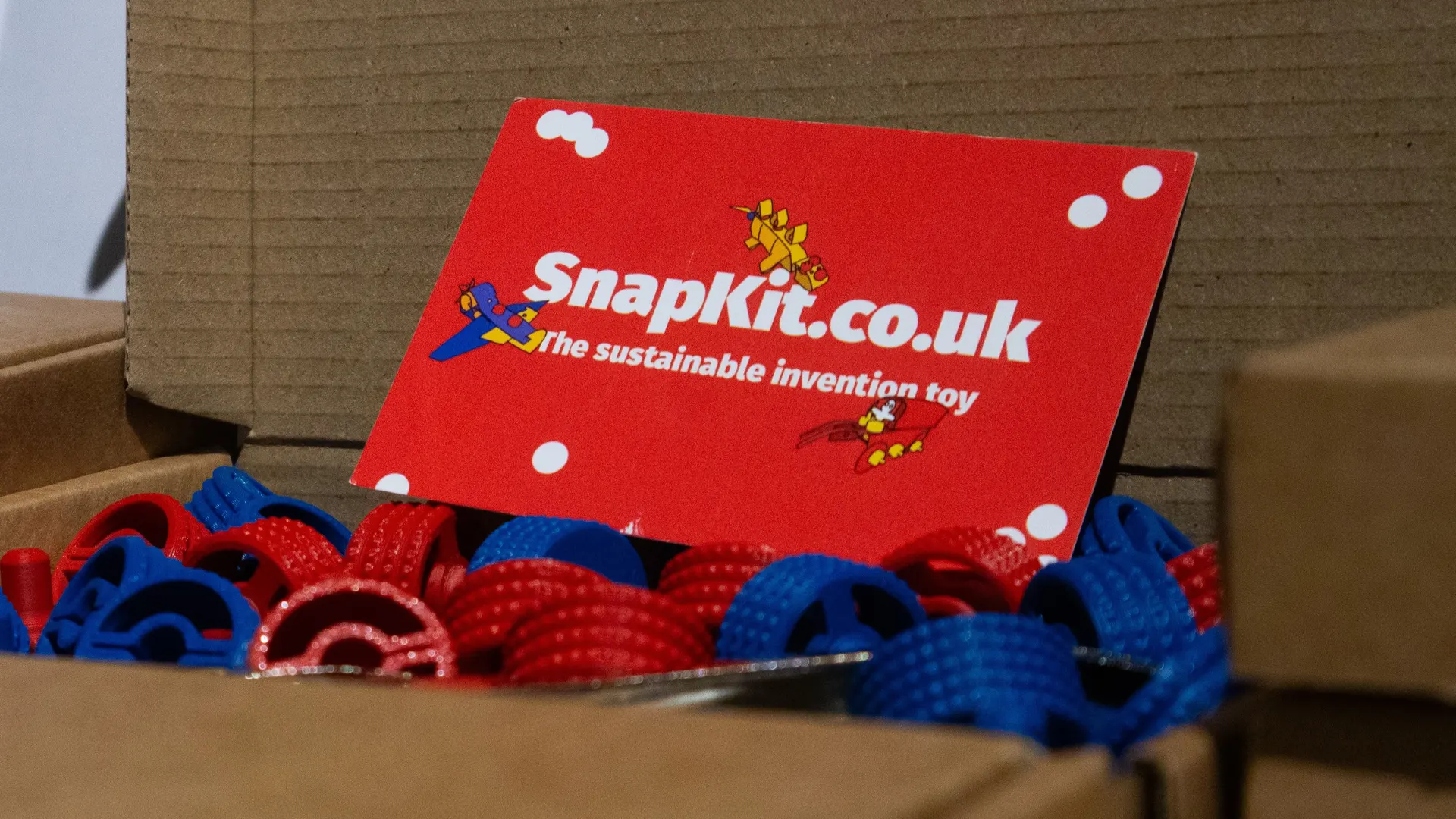 Kit ready to be posted out, in its packaging with business card inside