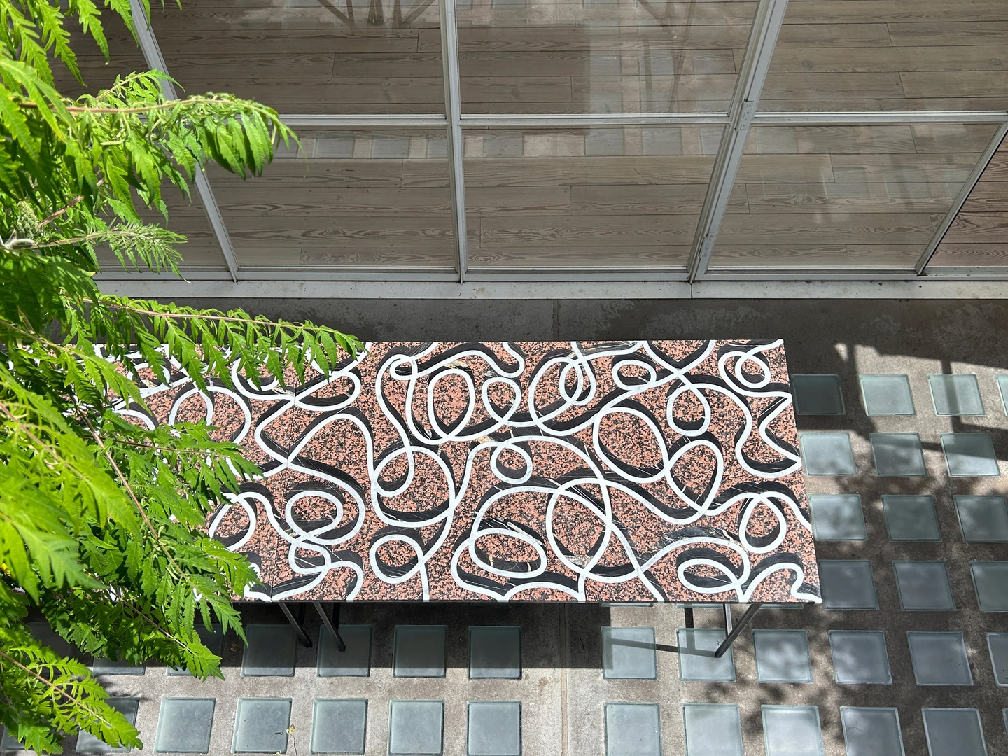 Picture showcases marble table by artist Rhys Coren and Peter Noyce