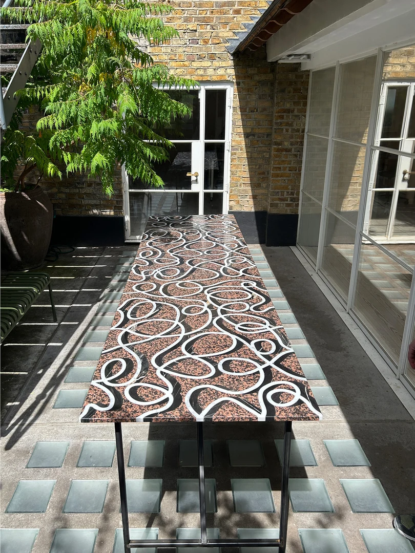Picture showcases marble table by artist Rhys Coren and Peter Noyce
