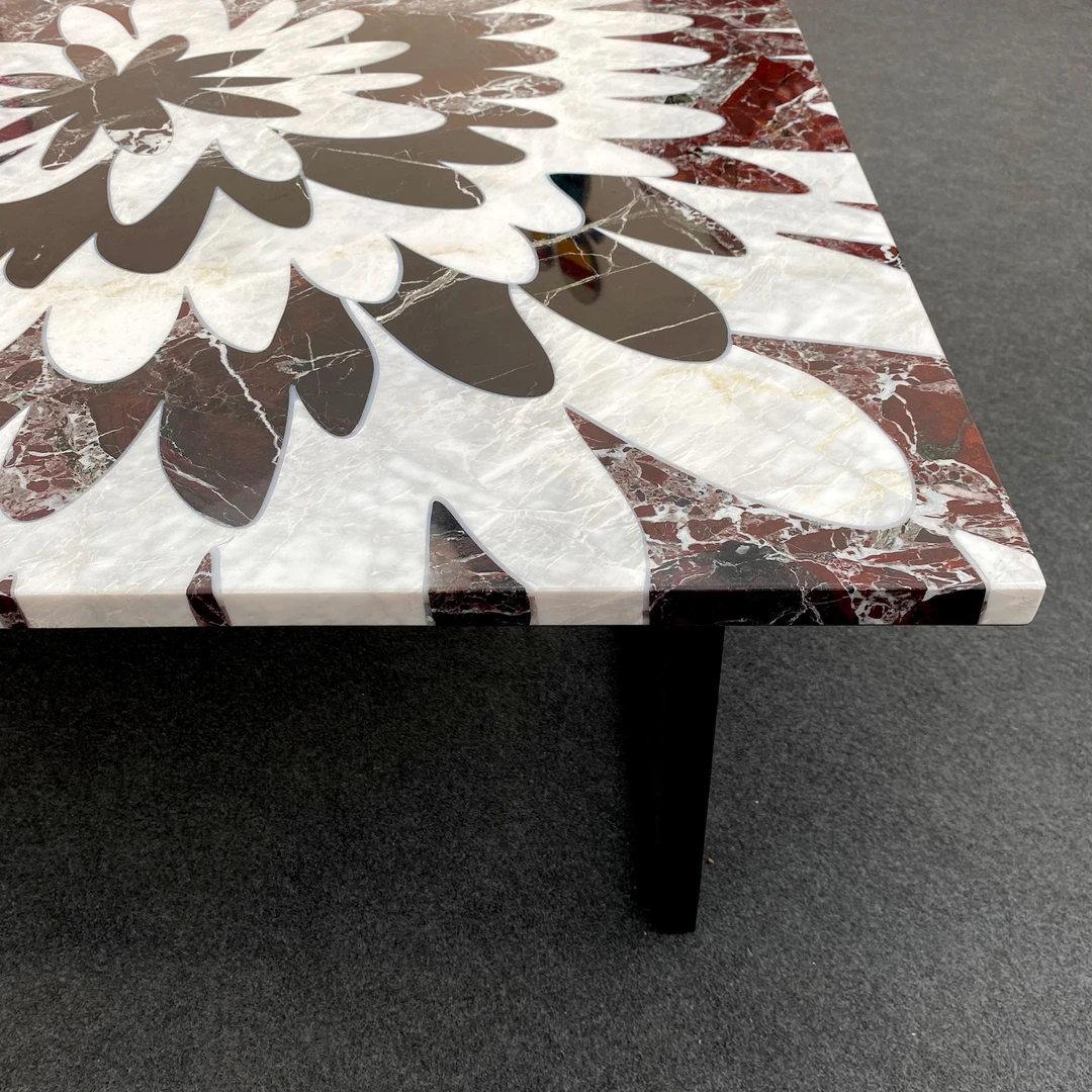 Picture showcases marble table by artist Rhys Coren and Peter Noyce