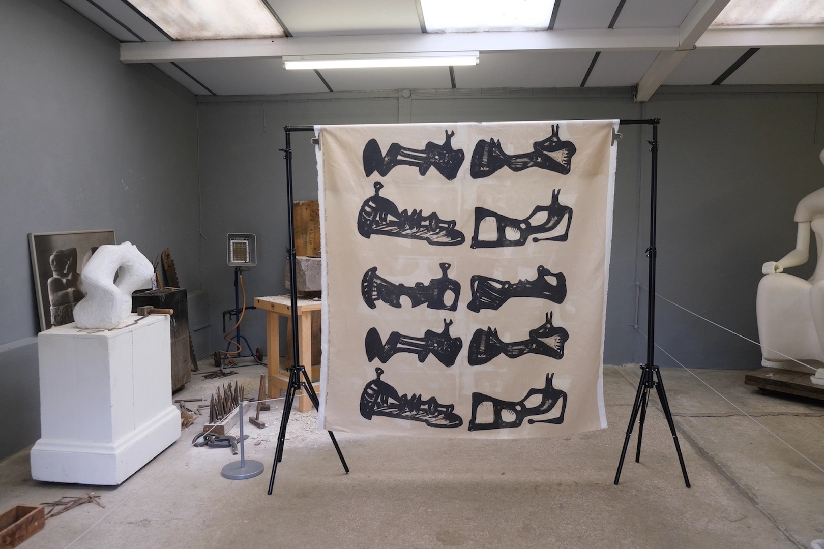 Fabric ‘Six Reclining Figures with Buff Background’ by Henry Moore in Henry Moore’s yellow brick studio