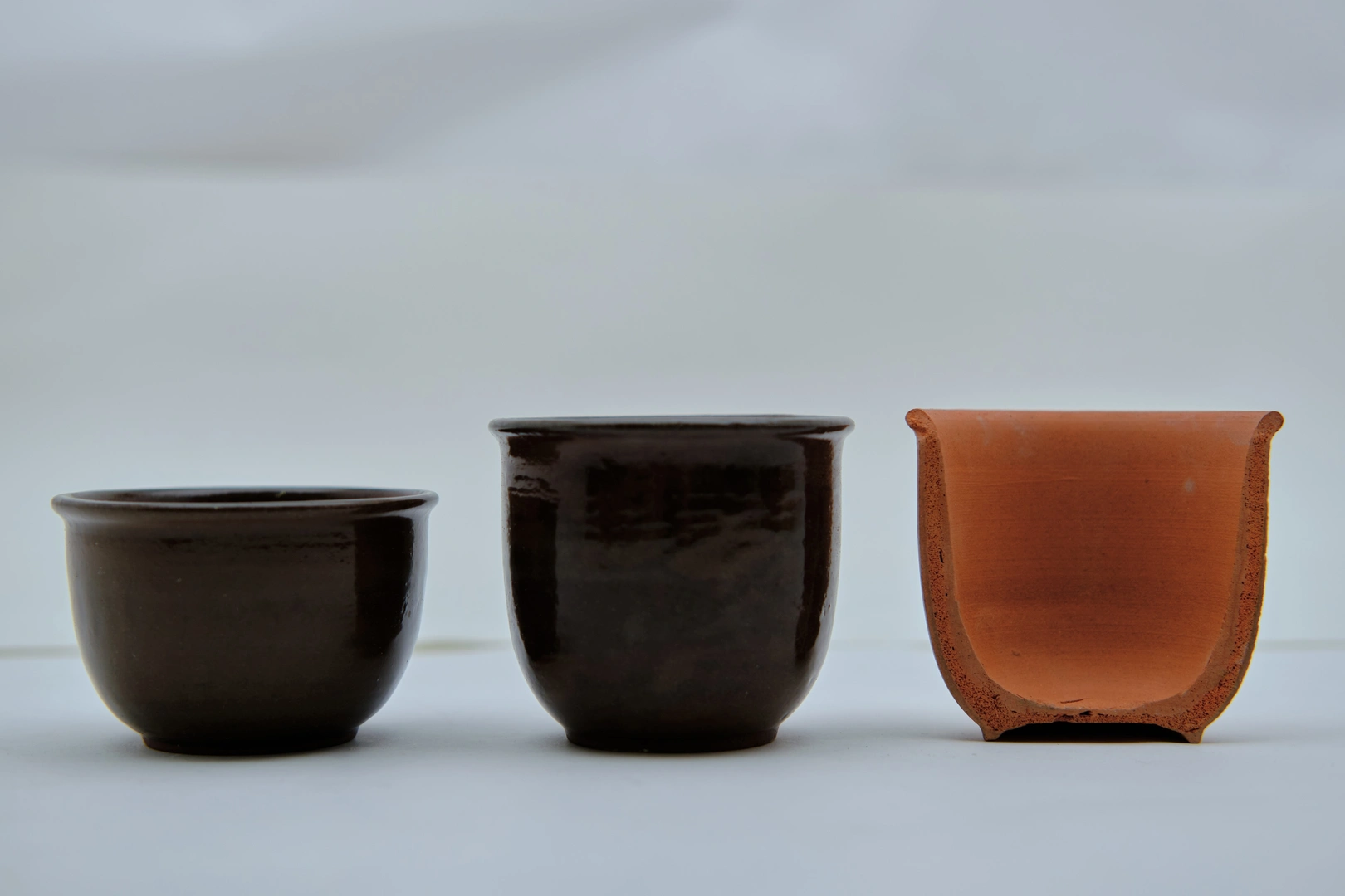A trio of ceramic coffee cup design examples