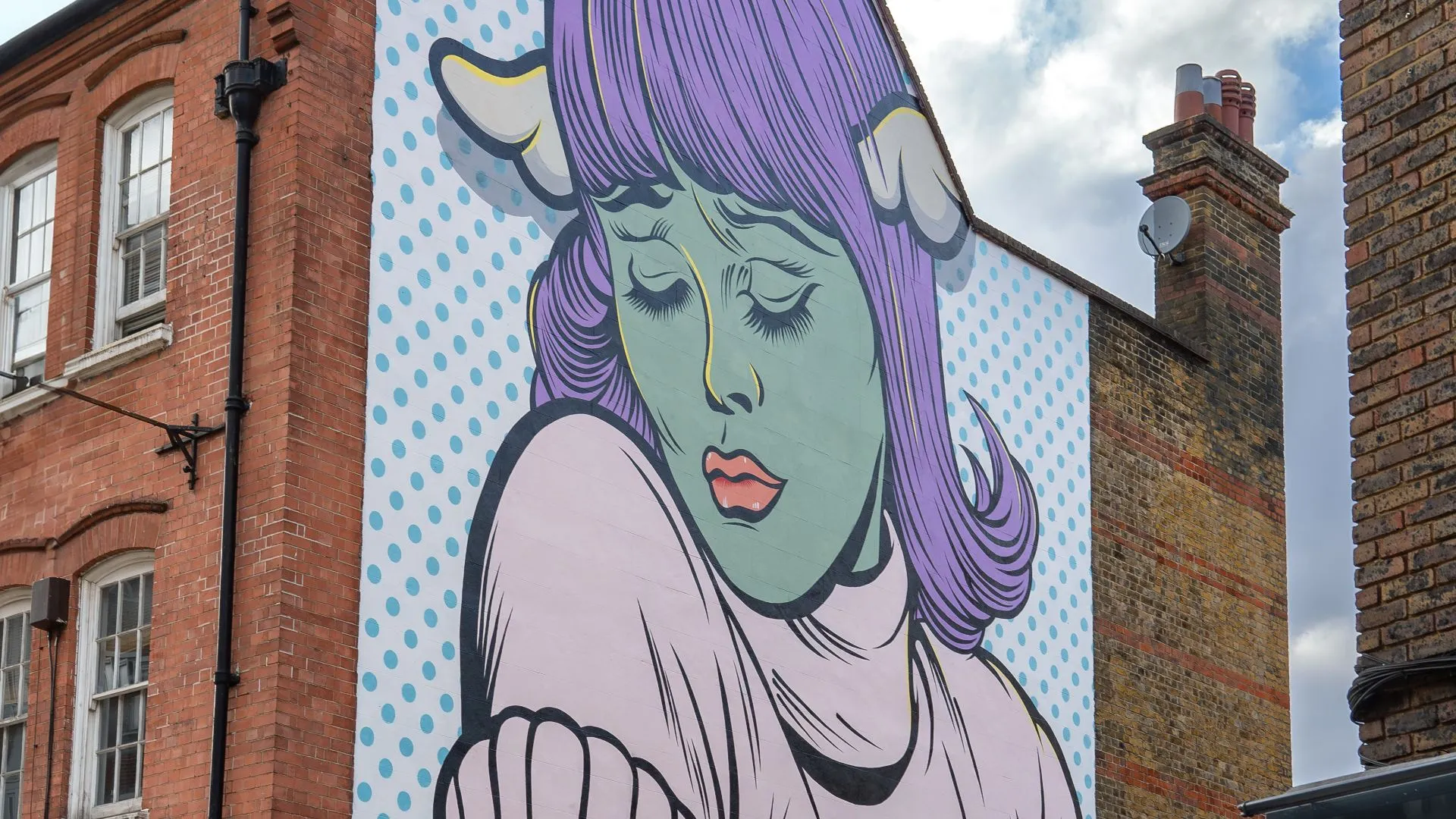 'A Dog in Hand...' mural by D*Face 
