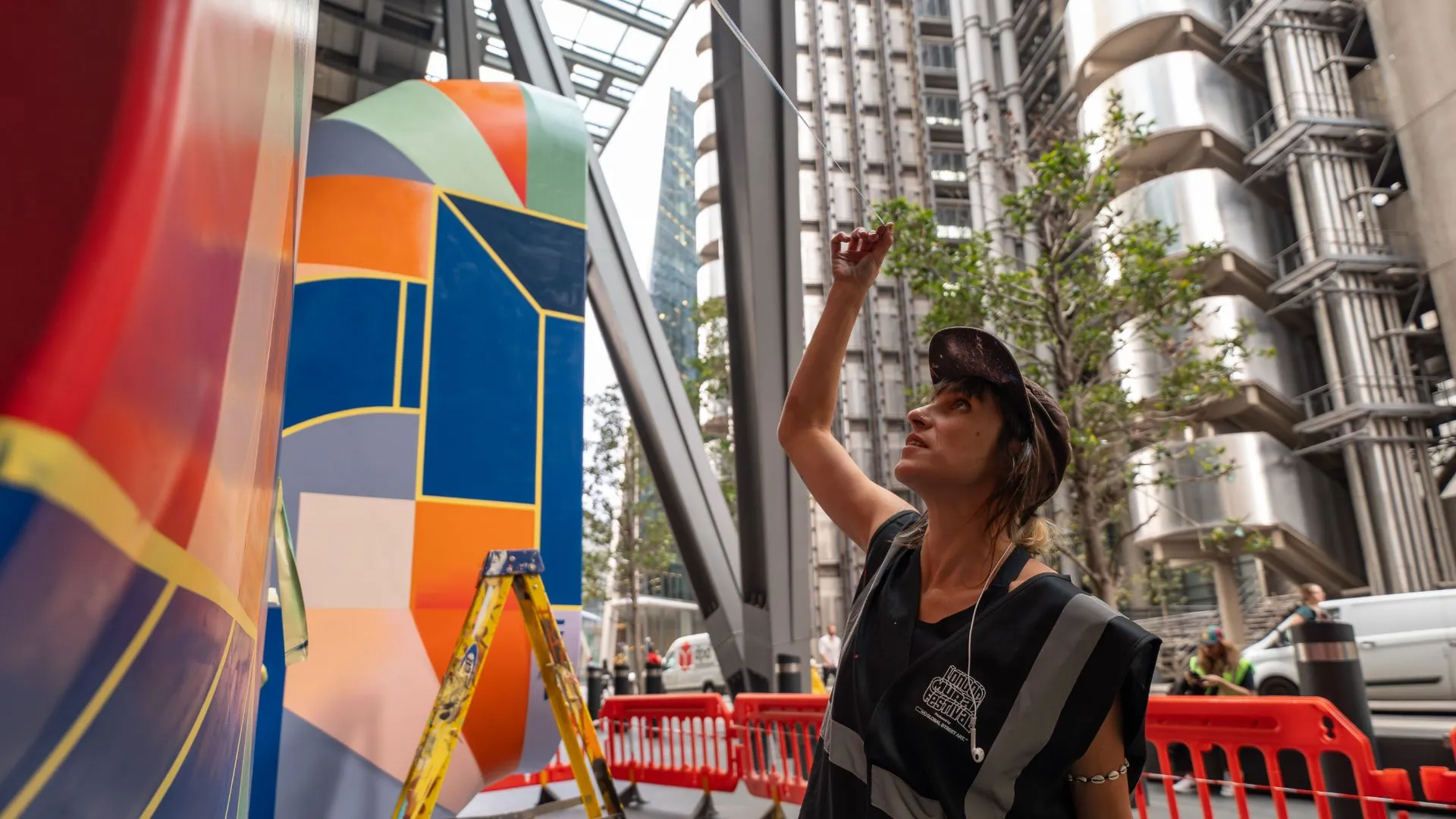 Anna Ovni at work on her Leadenhall Trumpets takeover
