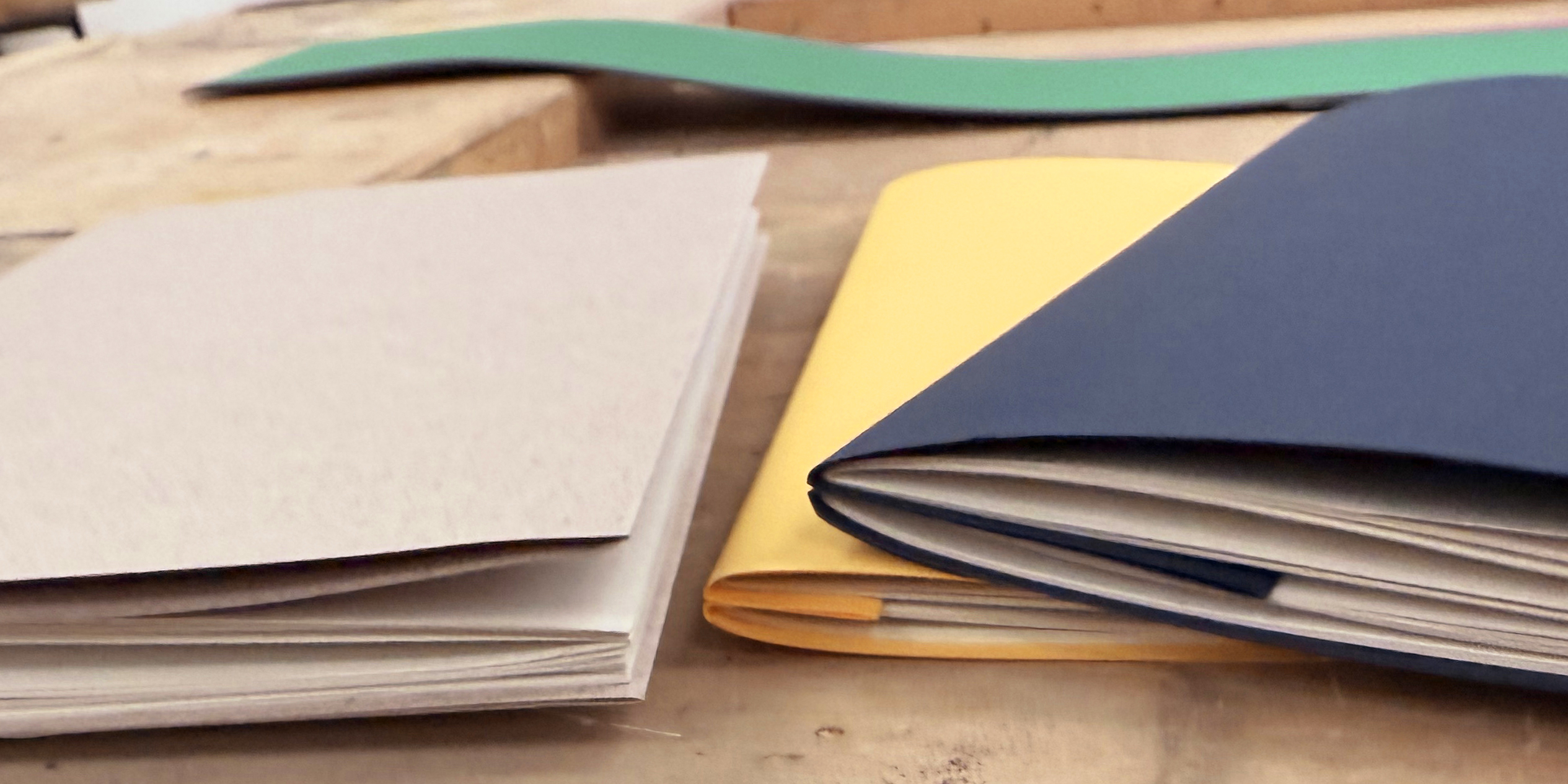 Books made during a bookbinding workshop.