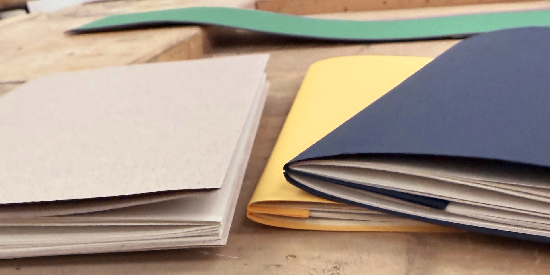 Books made during a bookbinding workshop.