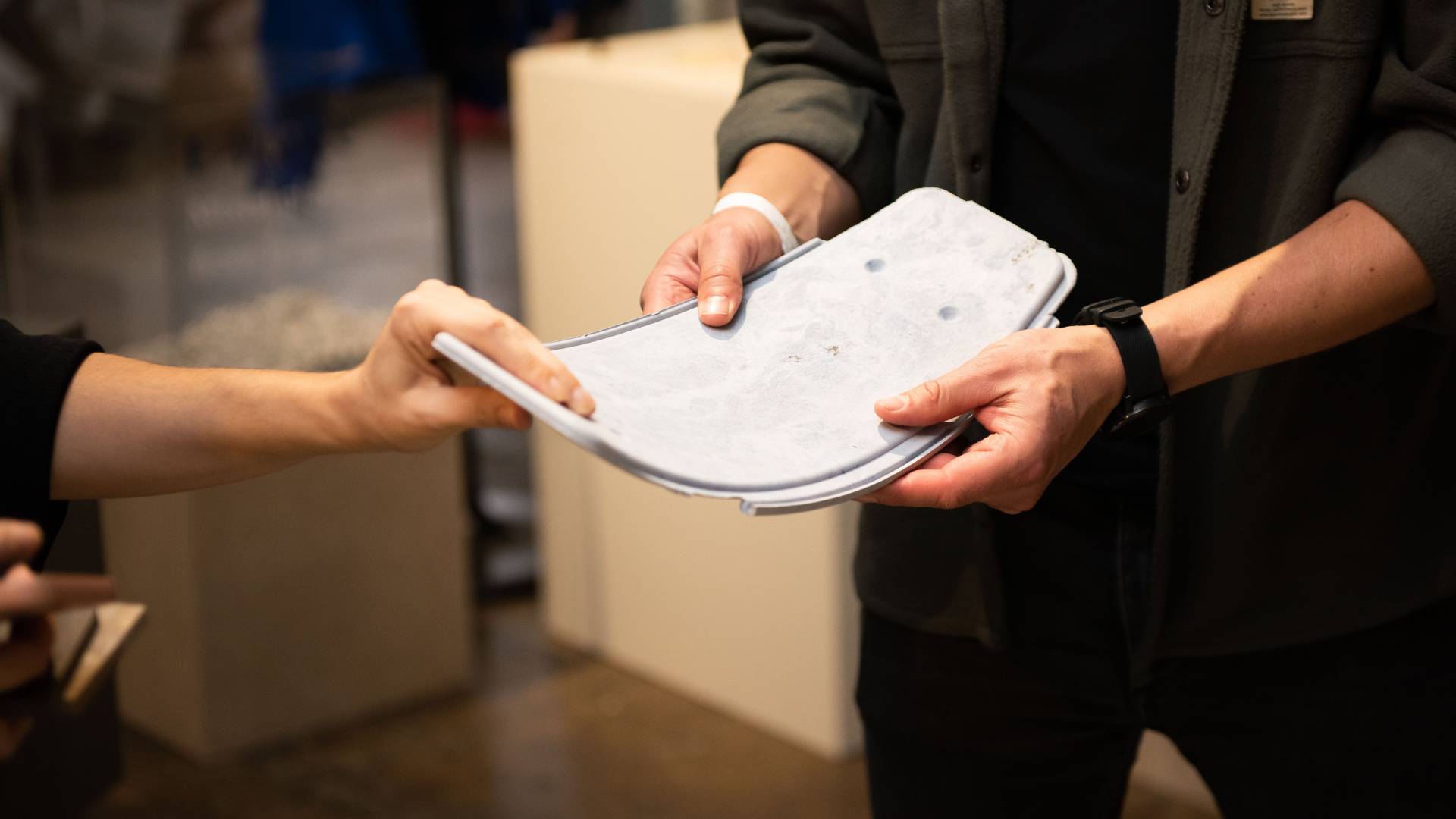 Trade show experience with two people experiencing a product