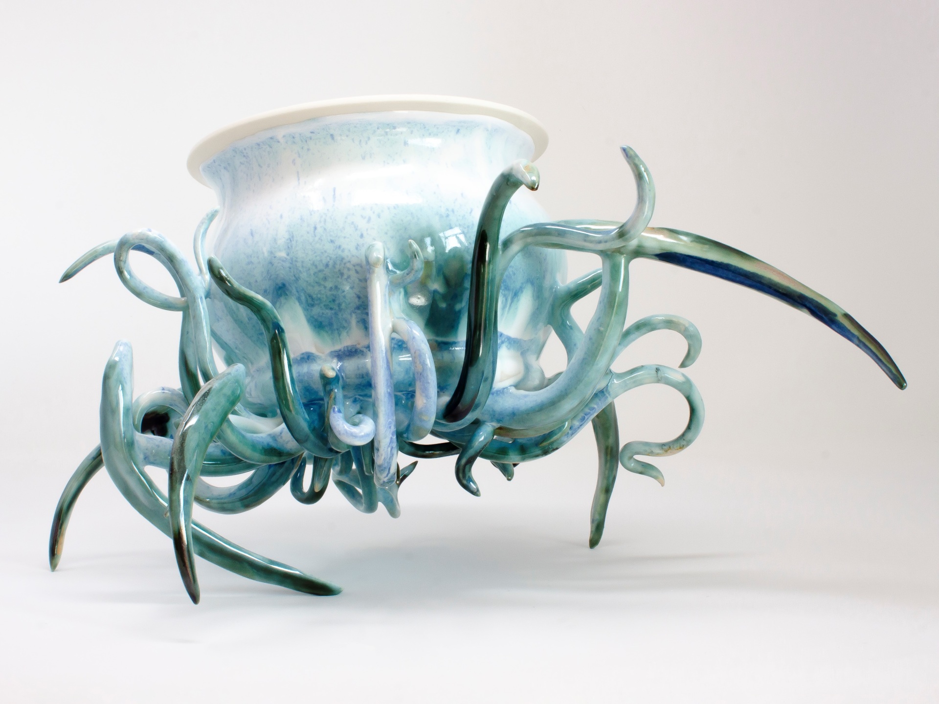Image of a ceramic pot with tentacles.
