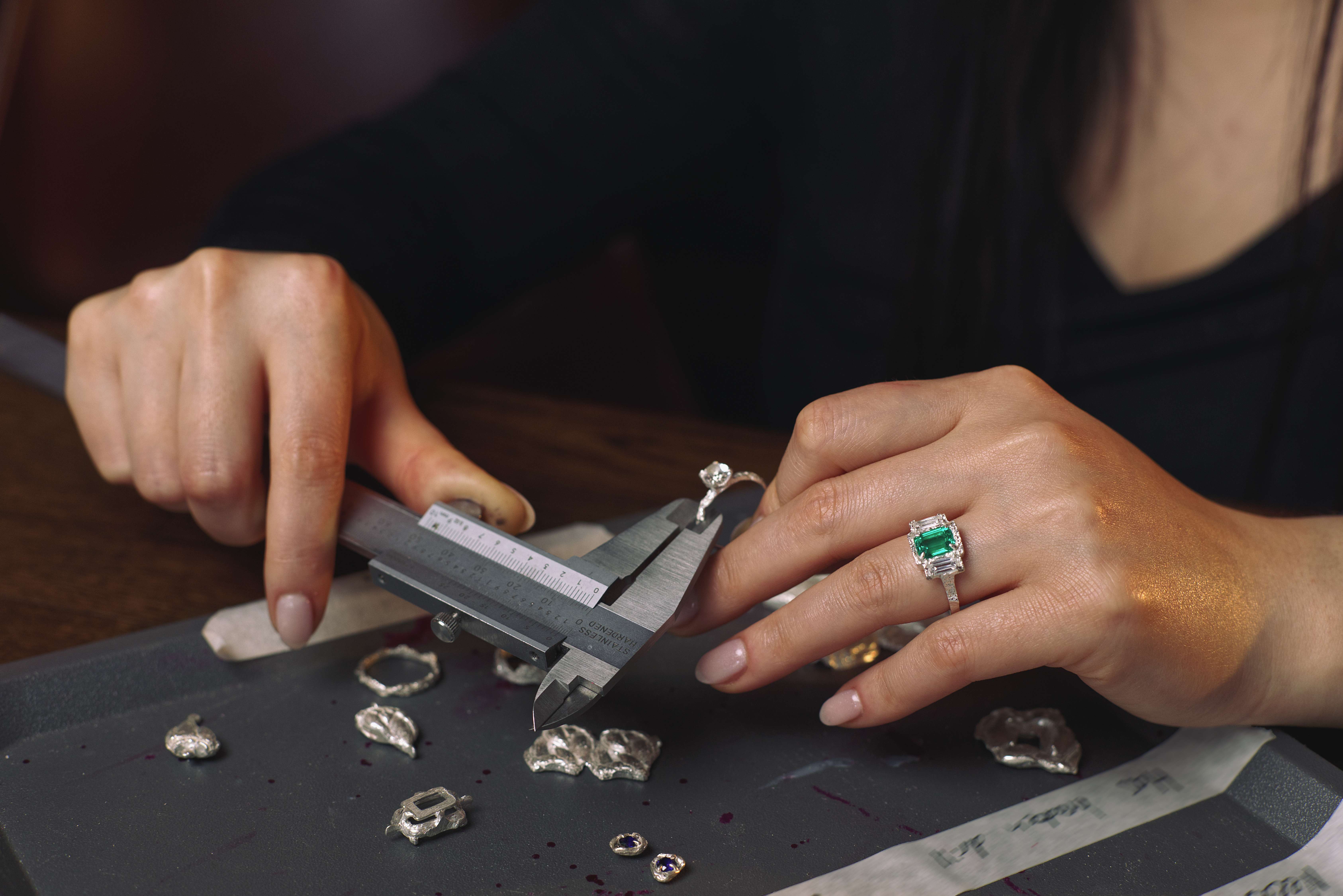 Image of a woman making a ring.