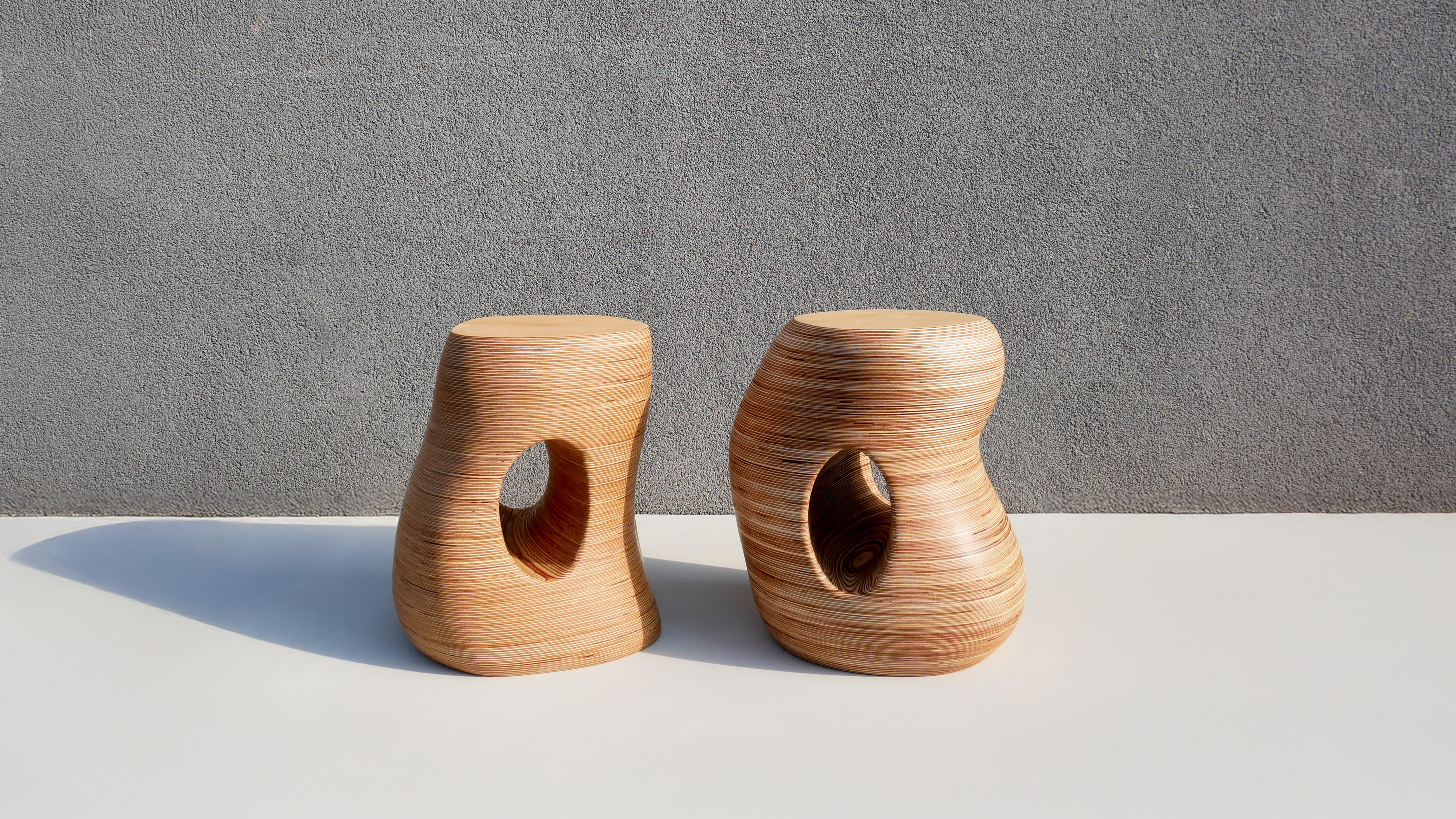 With intersecting curves and shifting planes, The Being stools captures a sense of movement and stillness.