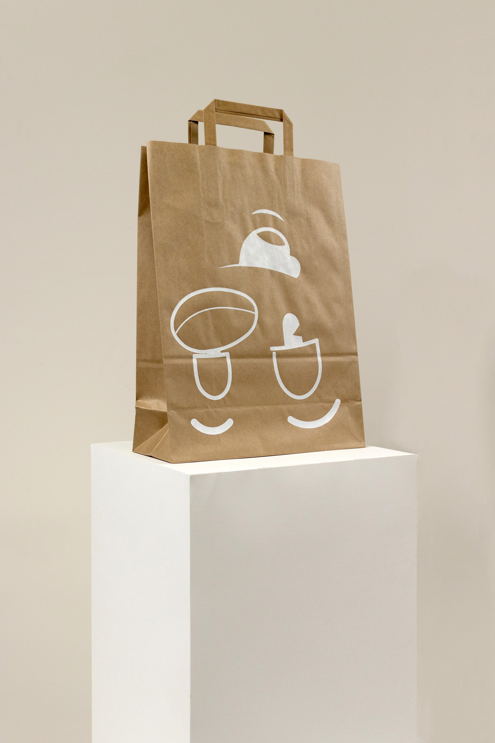 Brown paper bag with character face printed