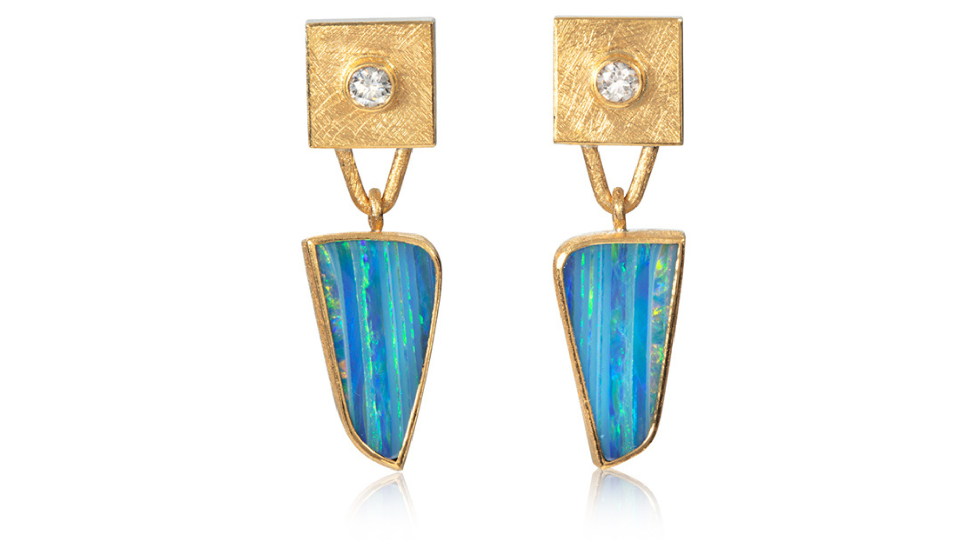 Image of a pair of turquoise earrings.
