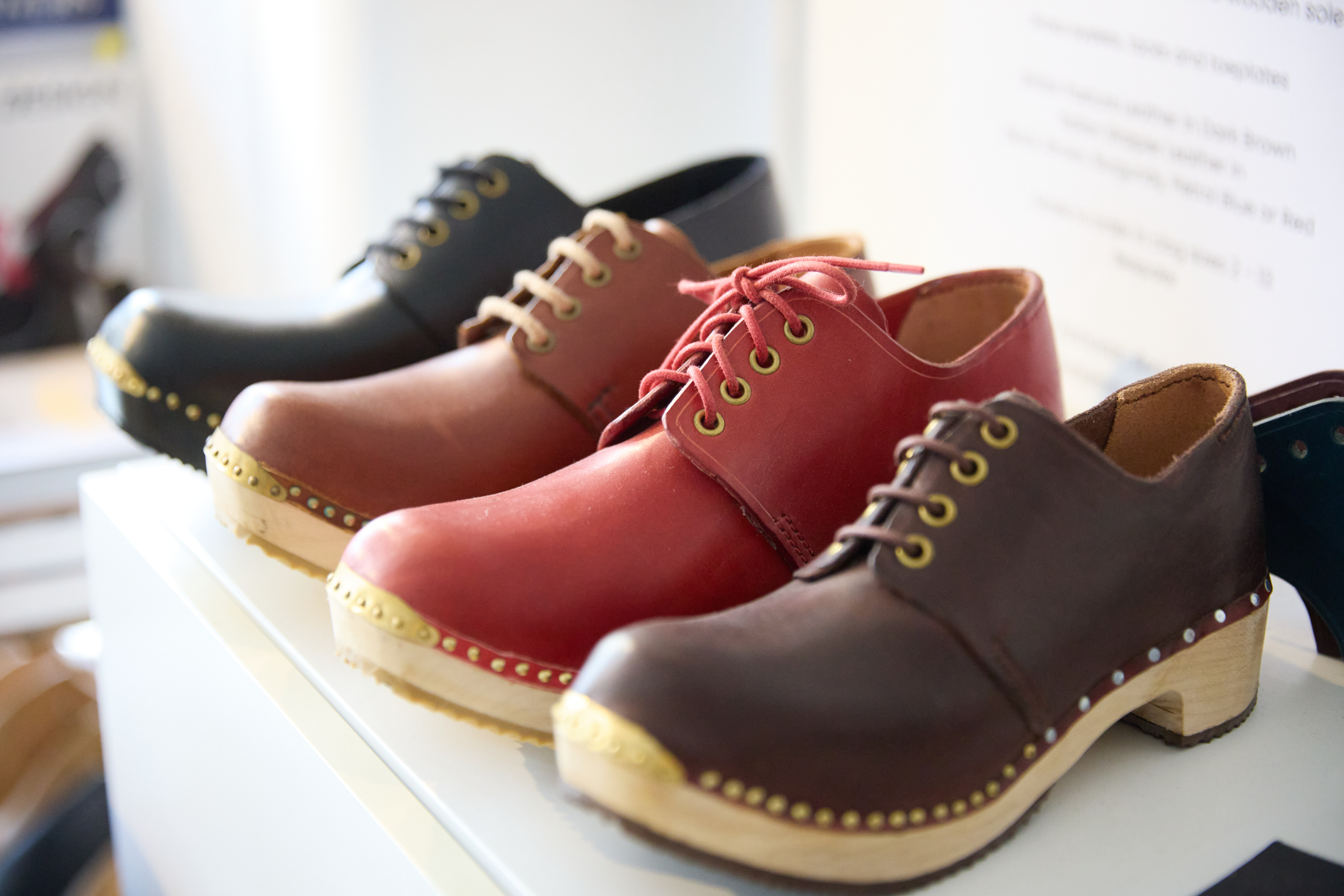 Image of a row of colourful shoes.