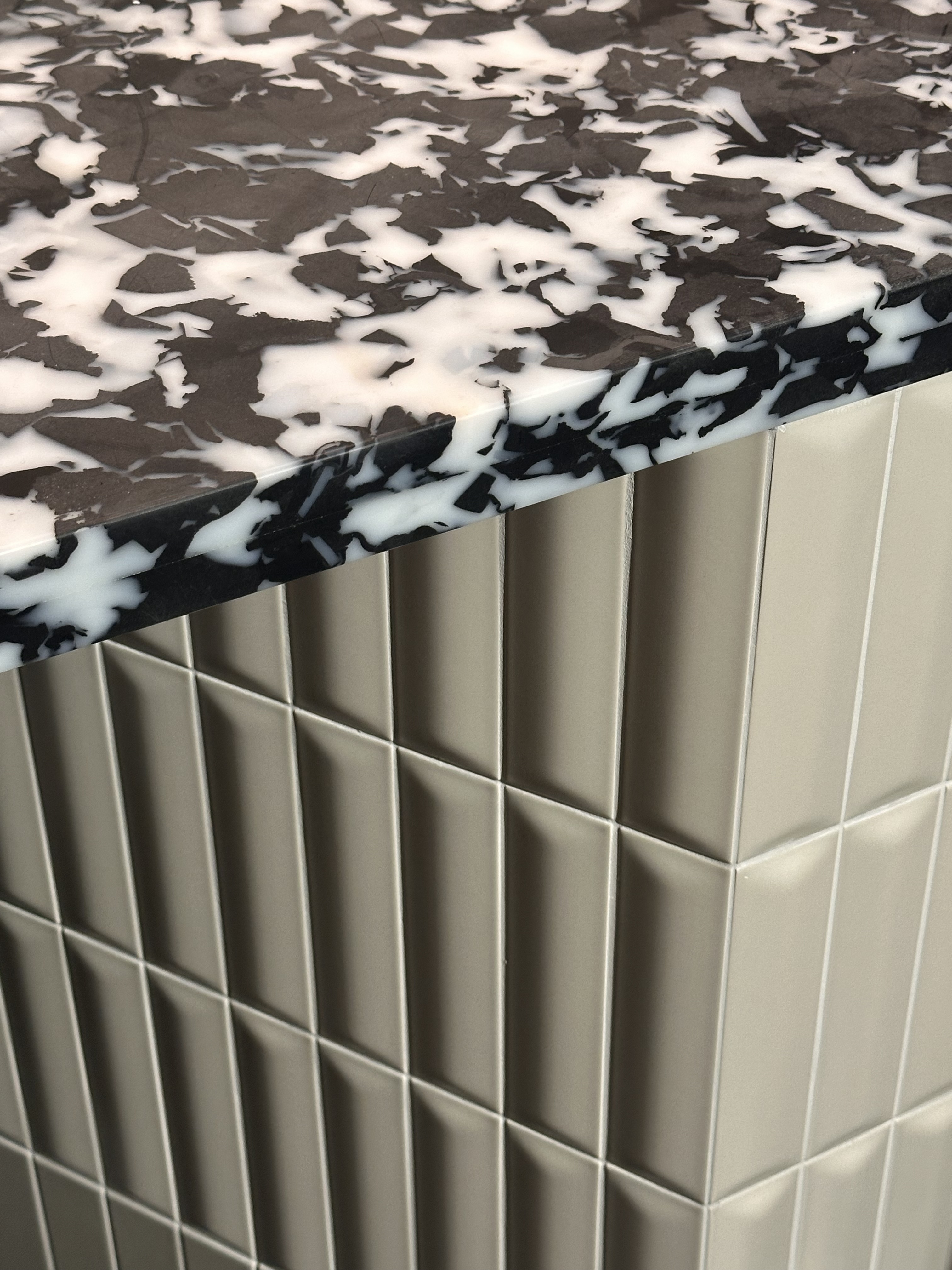 A geometric looking close up of materials used in a shop counter